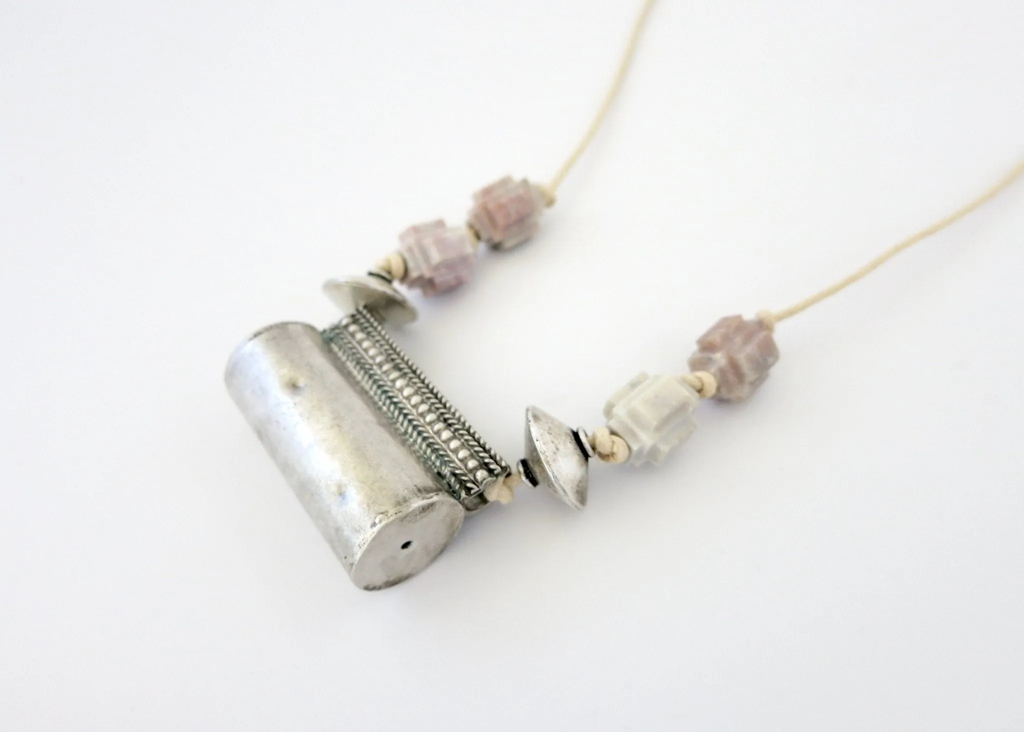Architecturally inspired, tubular Rajasthani tribal amulet