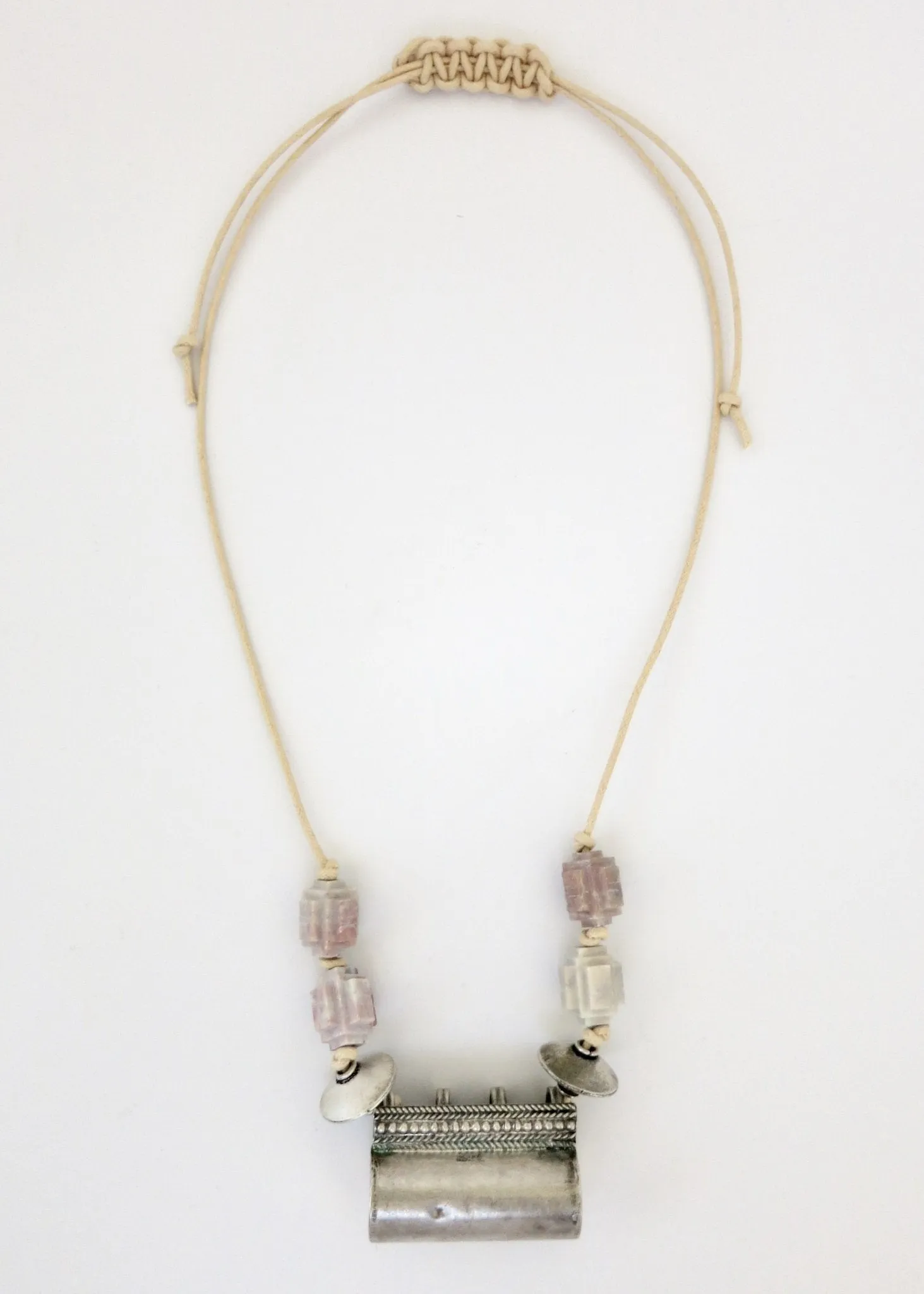 Architecturally inspired, tubular Rajasthani tribal amulet