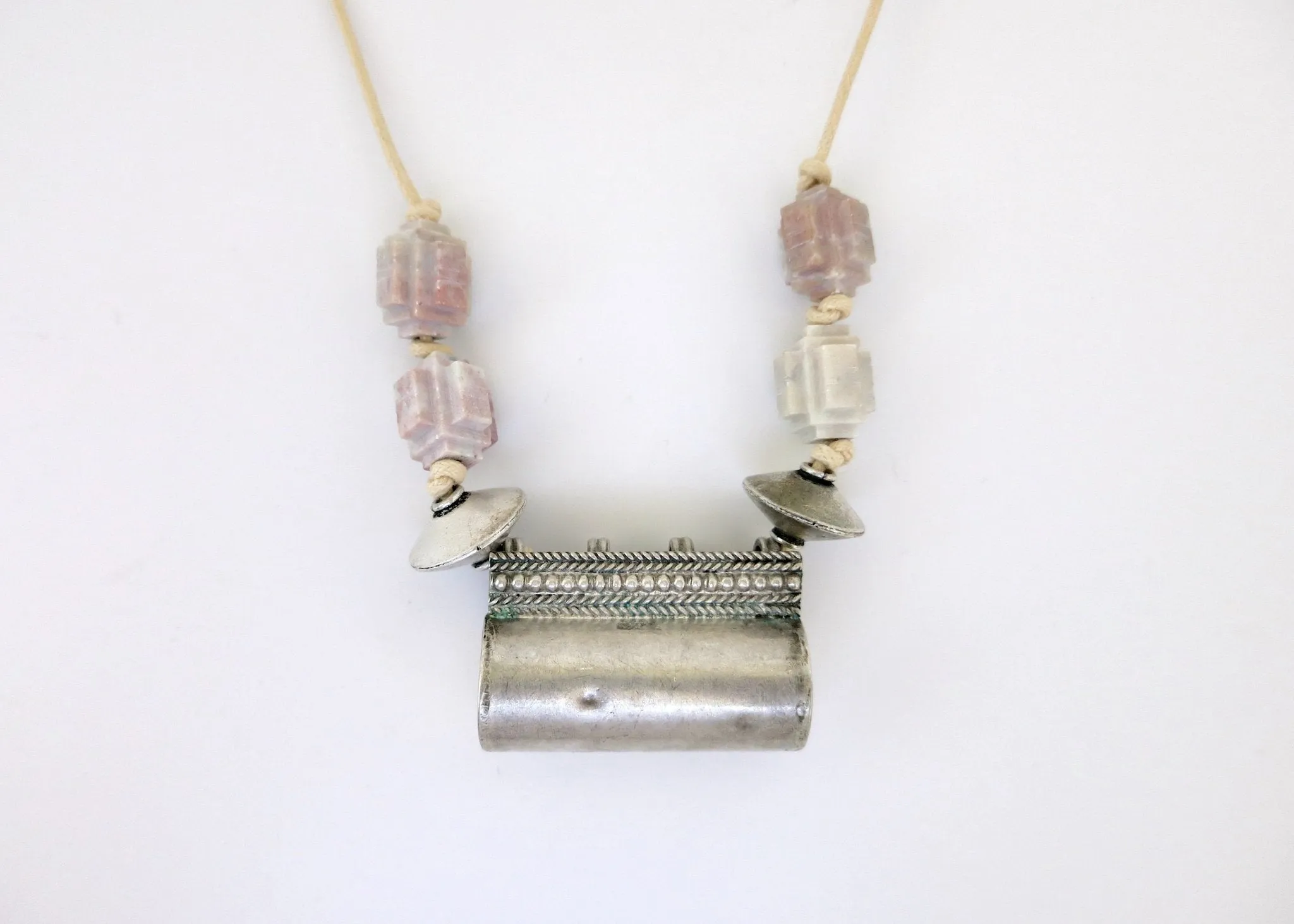 Architecturally inspired, tubular Rajasthani tribal amulet