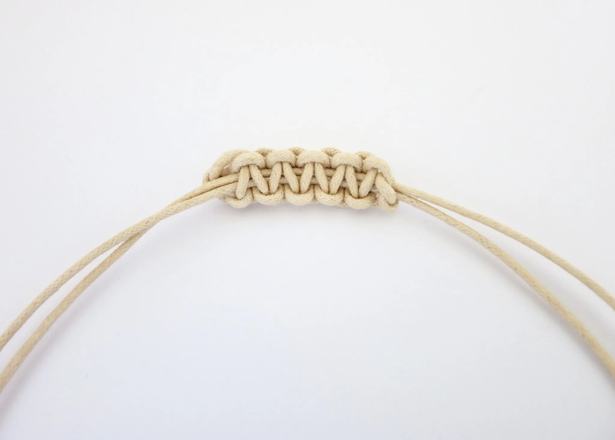 Architecturally inspired, tubular Rajasthani tribal amulet