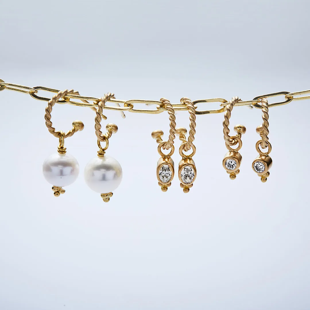 Ashley Twist Baby Hoops in 20K Peach Gold