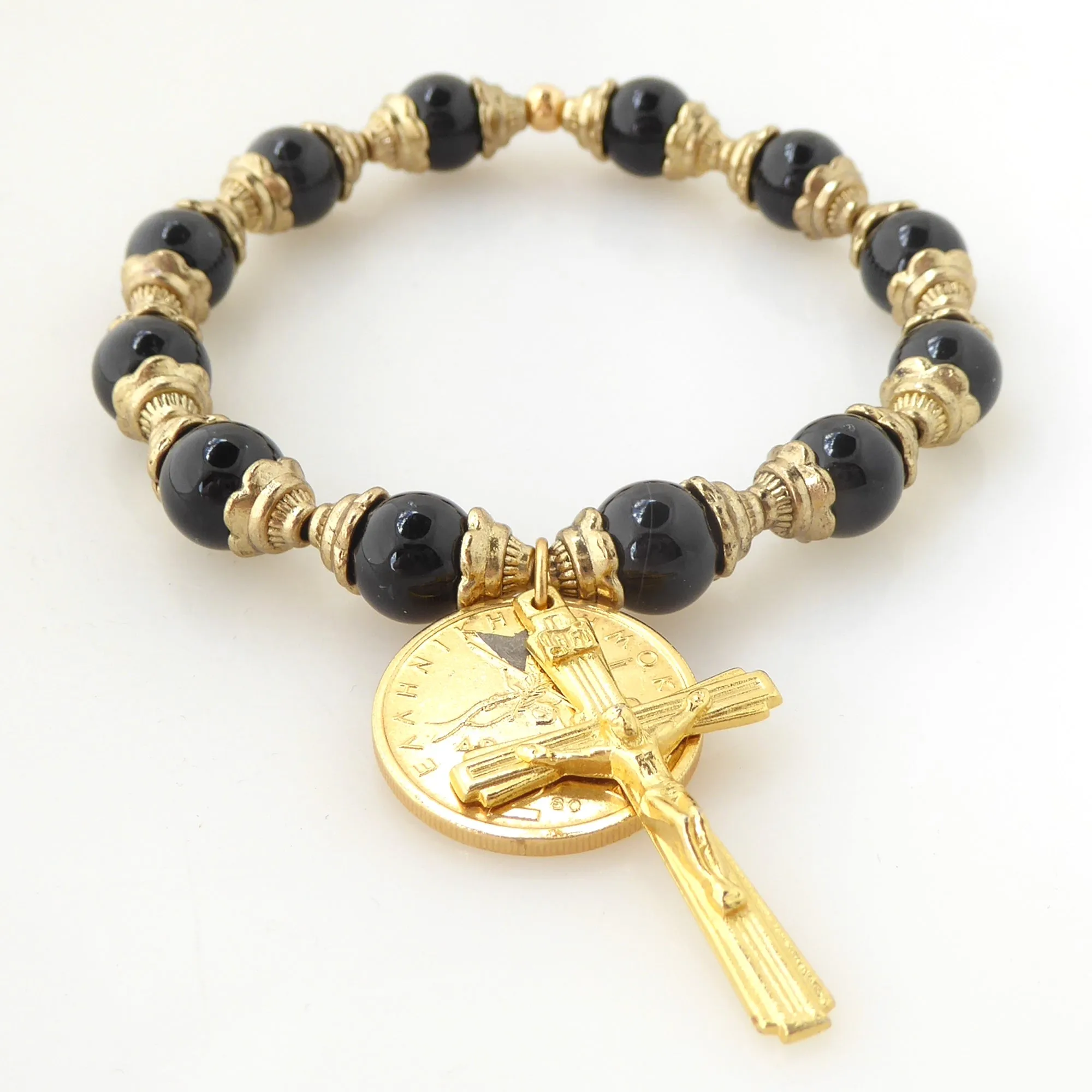 Black onyx and gold crucifix bracelet