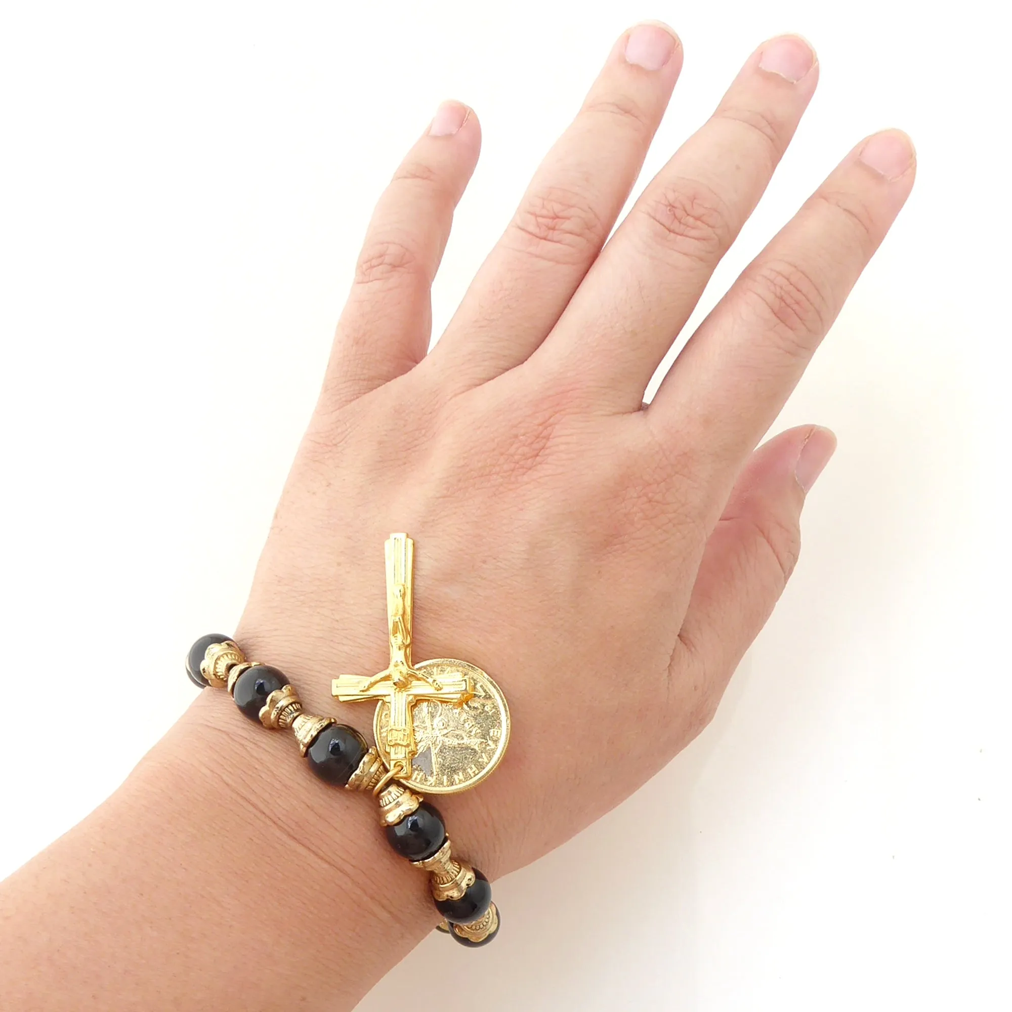 Black onyx and gold crucifix bracelet