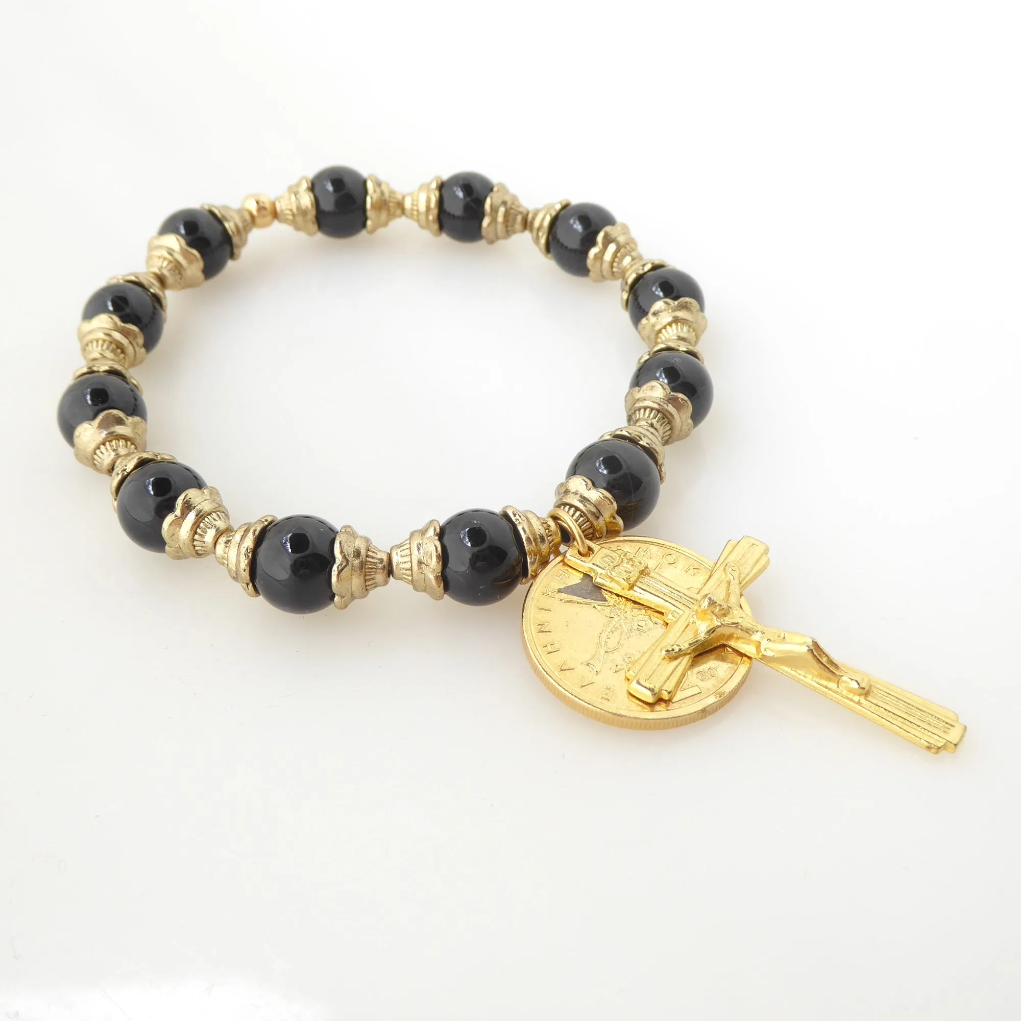 Black onyx and gold crucifix bracelet