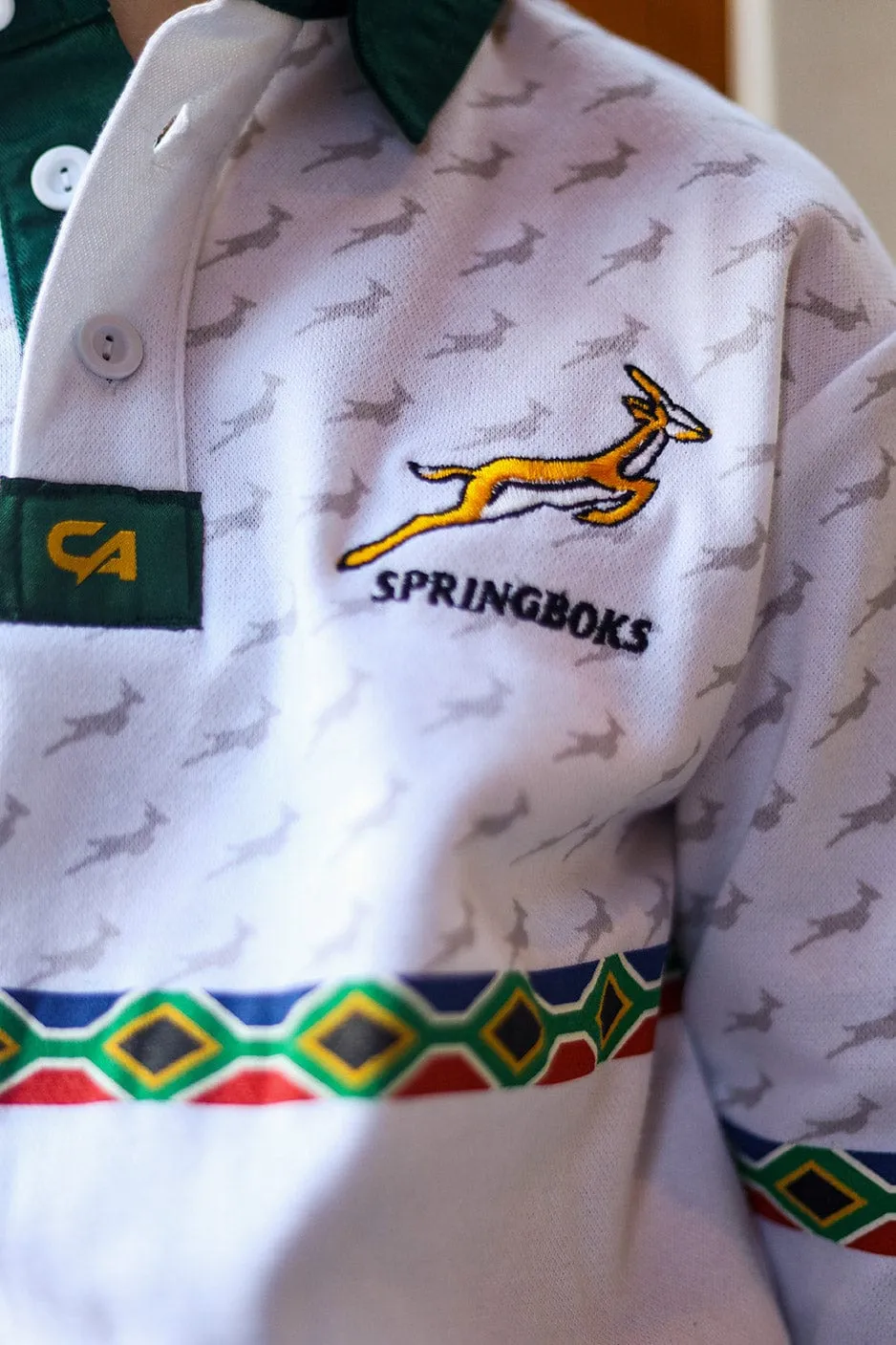 CA JNR Supporters Cotton Golfer L/Sleeve | White Amandla