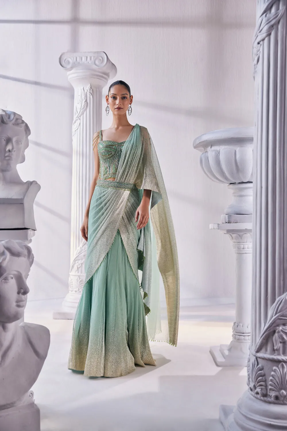 Draped Layer Lehenga In Sequin And Pleated Gold Foil Lycra. The Corsetfeatures Heavy Beads, Tassels And Zardozi Work.