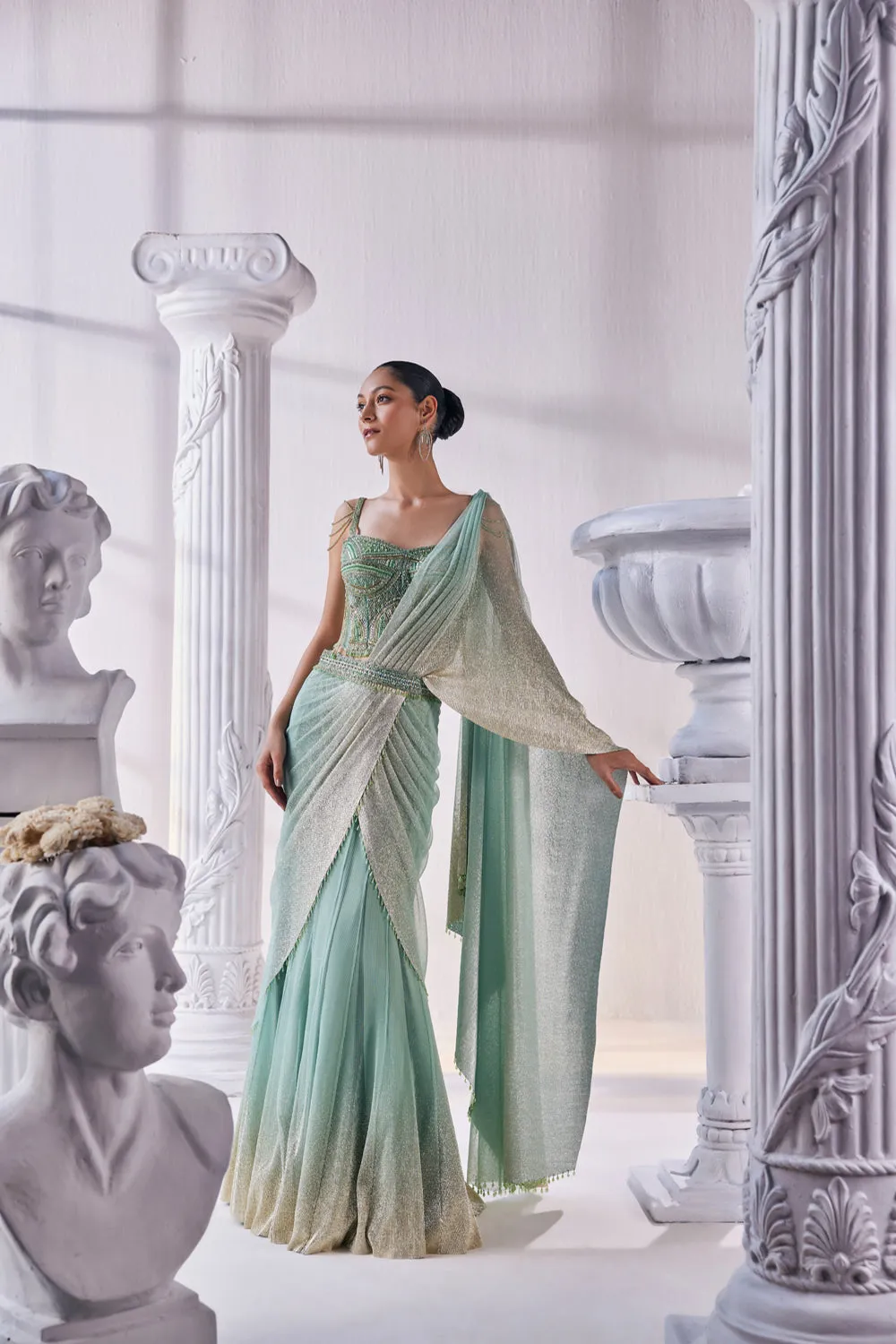 Draped Layer Lehenga In Sequin And Pleated Gold Foil Lycra. The Corsetfeatures Heavy Beads, Tassels And Zardozi Work.
