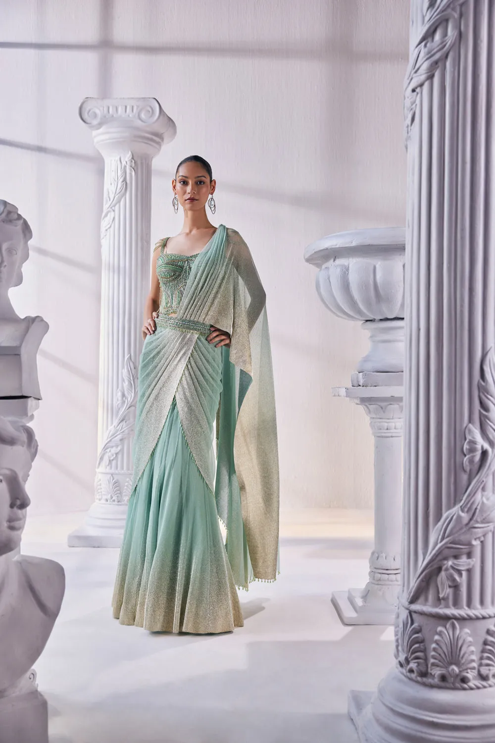 Draped Layer Lehenga In Sequin And Pleated Gold Foil Lycra. The Corsetfeatures Heavy Beads, Tassels And Zardozi Work.