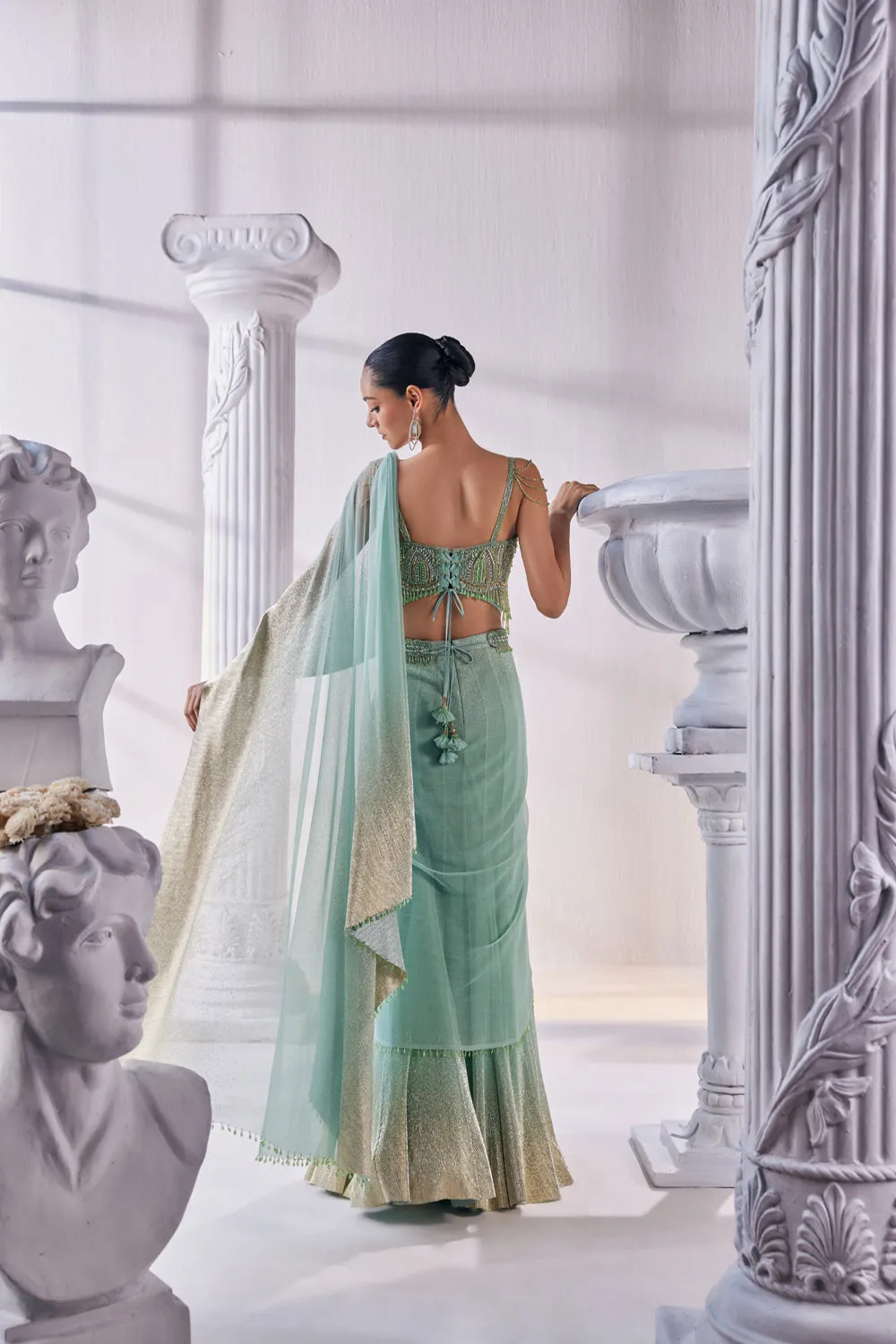 Draped Layer Lehenga In Sequin And Pleated Gold Foil Lycra. The Corsetfeatures Heavy Beads, Tassels And Zardozi Work.