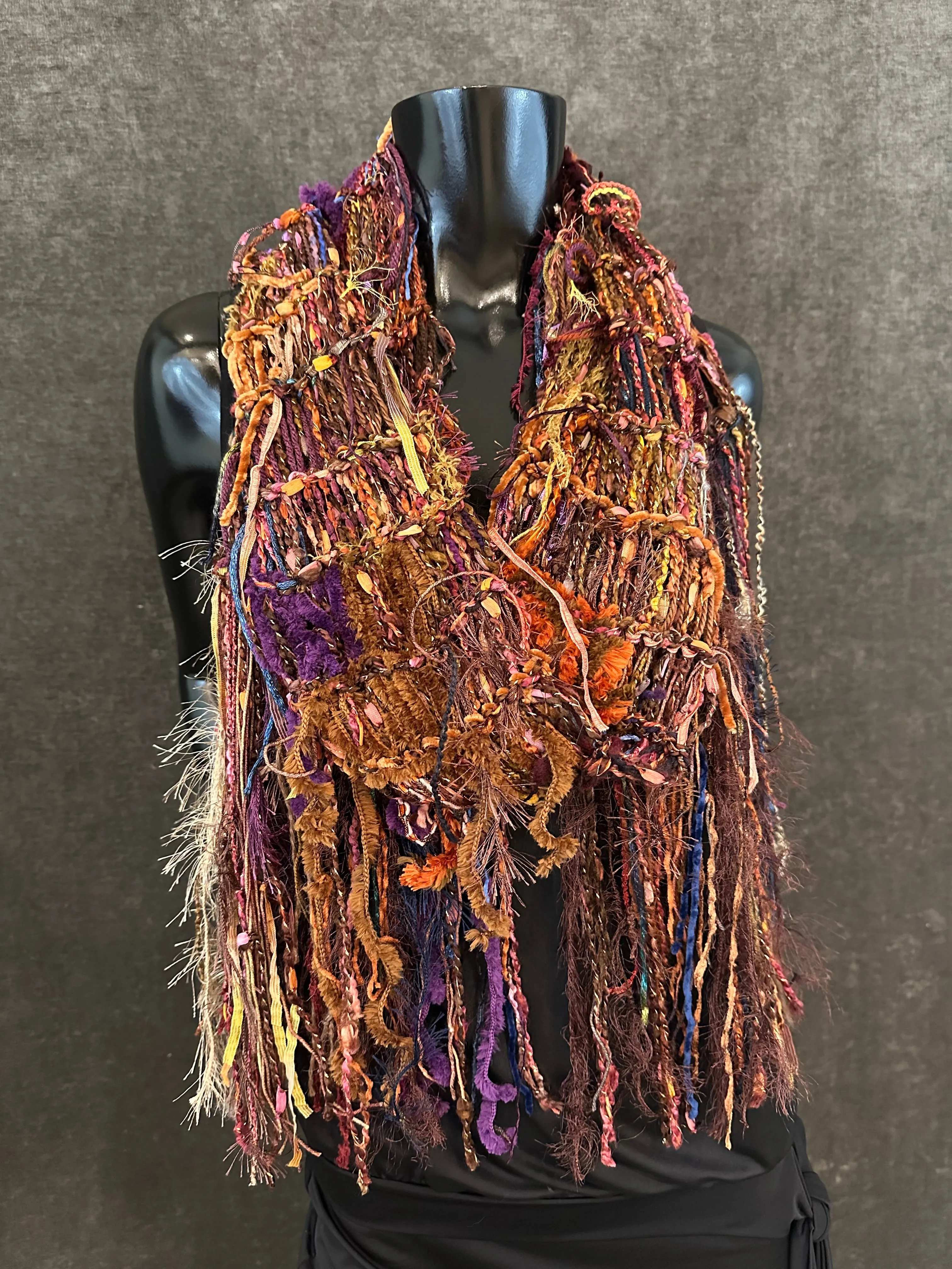 Hand knit Boho style fringed scarf in autumn shades