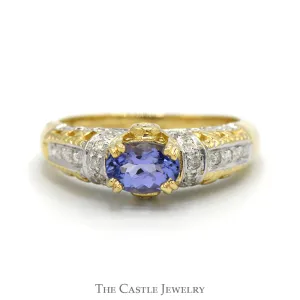 Oval Tanzanite Ring with Diamond Accented Sides in Ornate 14k Yellow Gold Mounting