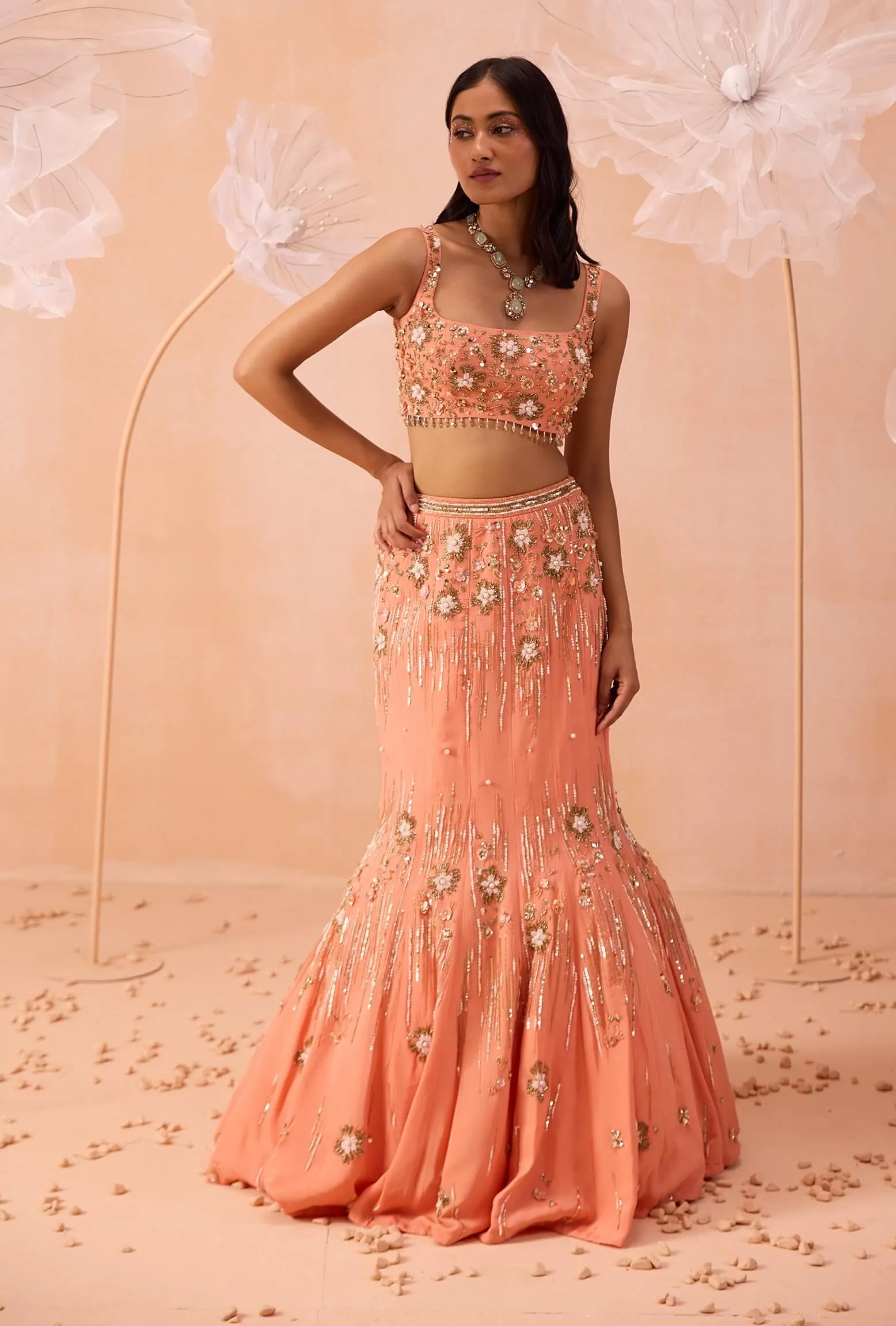 Peachy pearl embellished lehenga set