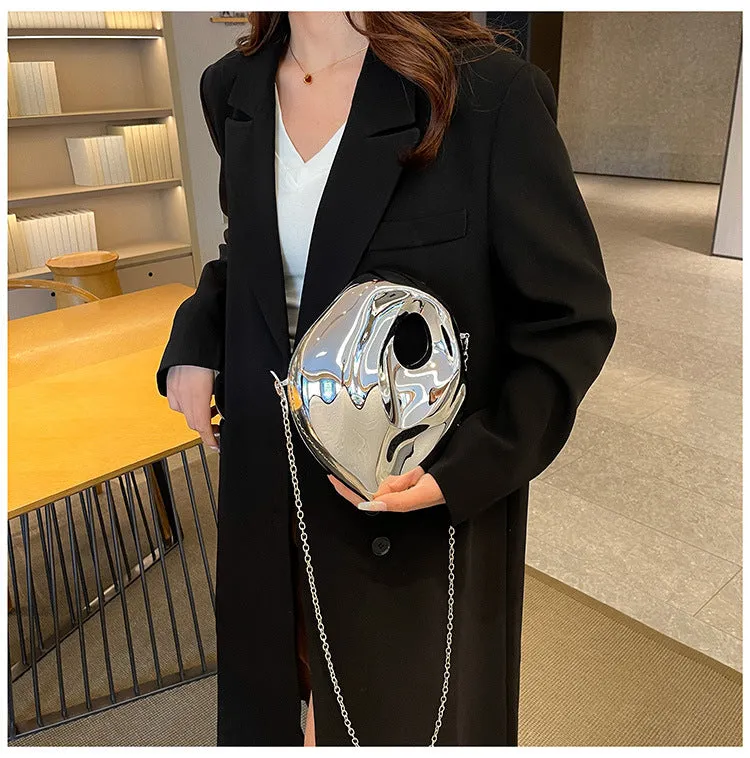 Sculptural Metallic Handbag with Abstract Modern Design for High-Fashion Elegance