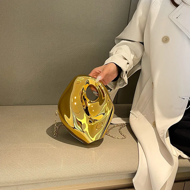 Sculptural Metallic Handbag with Abstract Modern Design for High-Fashion Elegance