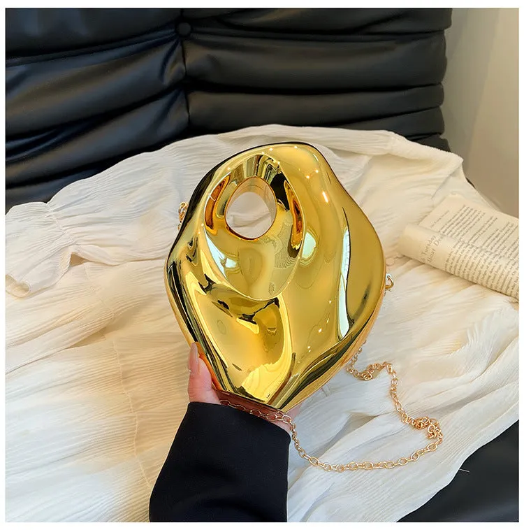 Sculptural Metallic Handbag with Abstract Modern Design for High-Fashion Elegance