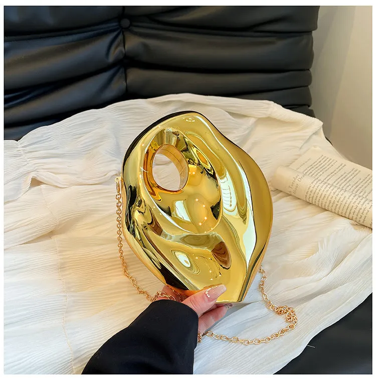 Sculptural Metallic Handbag with Abstract Modern Design for High-Fashion Elegance